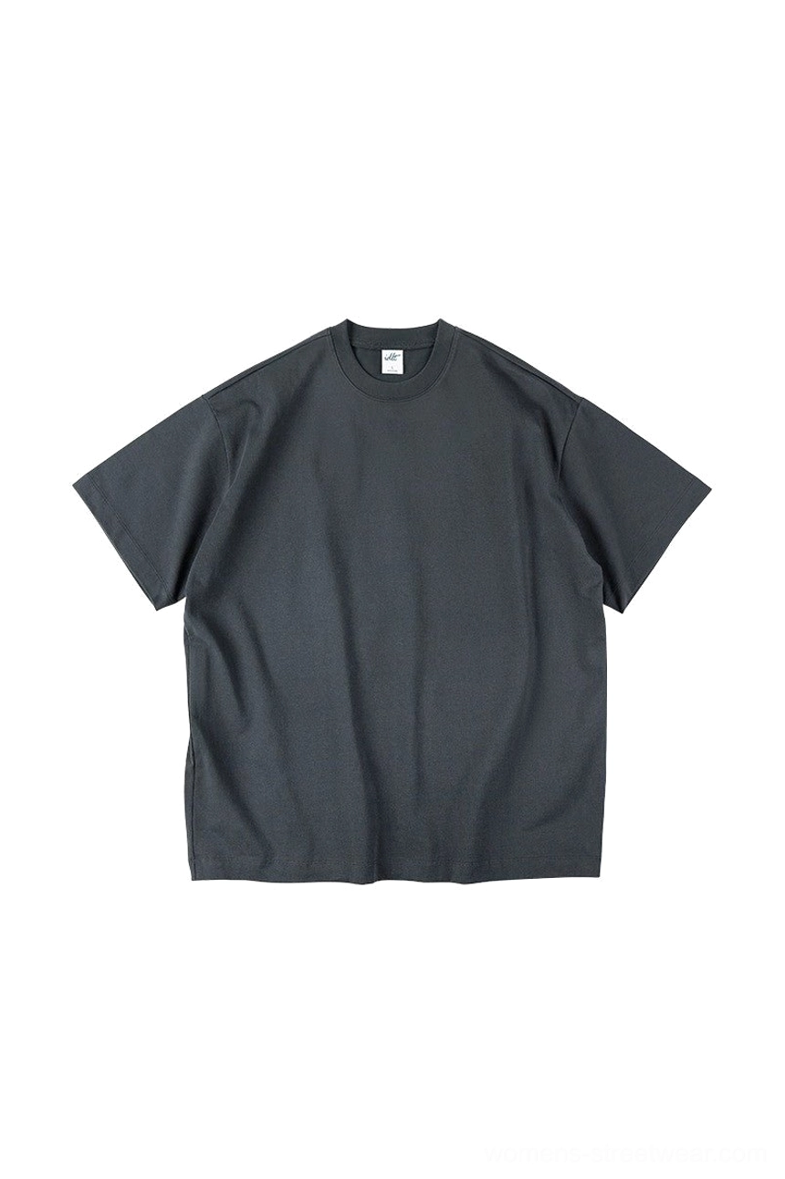 Dark slate gray oversized heavyweight cotton t-shirt showing relaxed drape and dropped shoulder construction