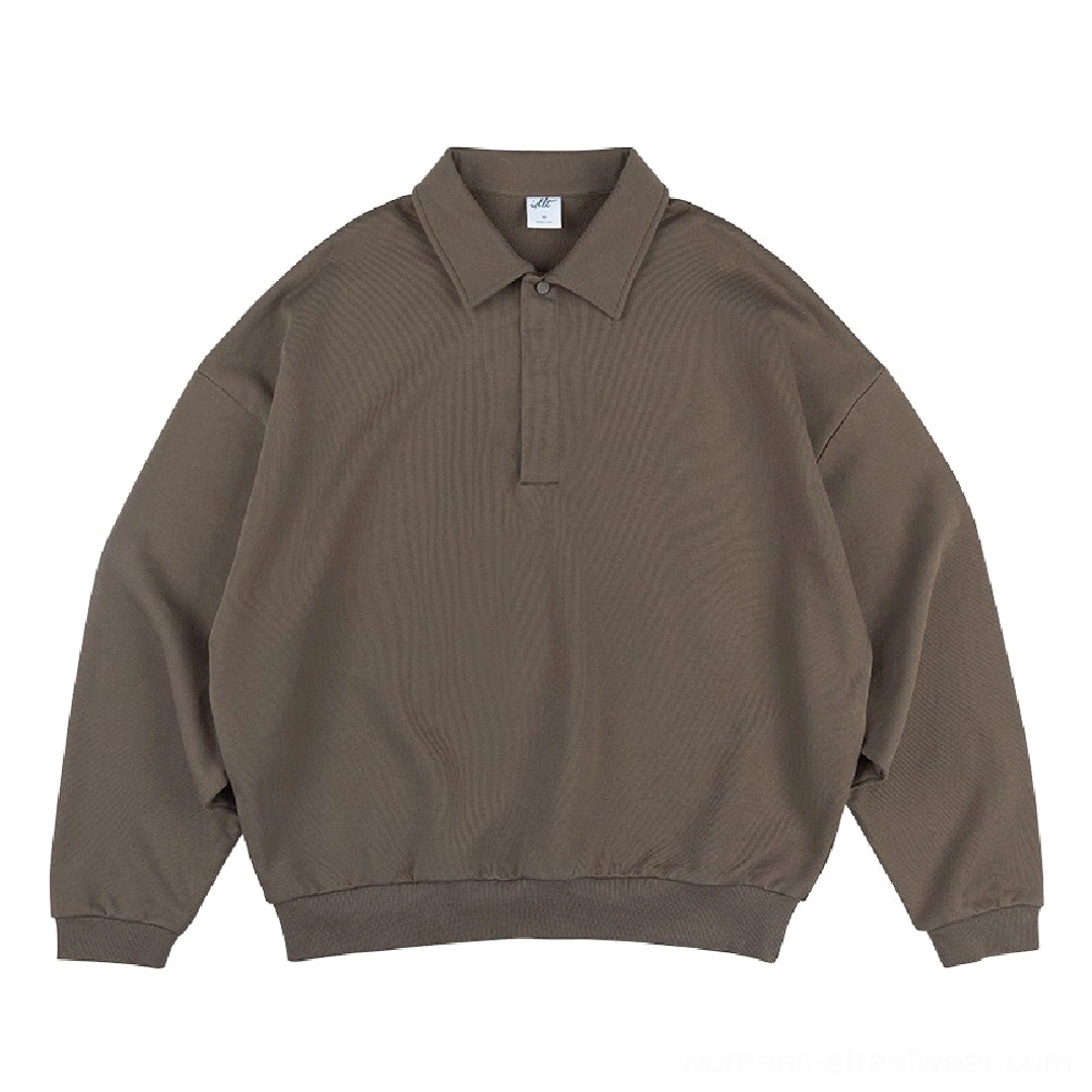 Dark taupe brown long sleeve polo sweater with buttoned polo neckline, drop shoulder sleeves, ribbed cuffs, and heavyweight cotton feel