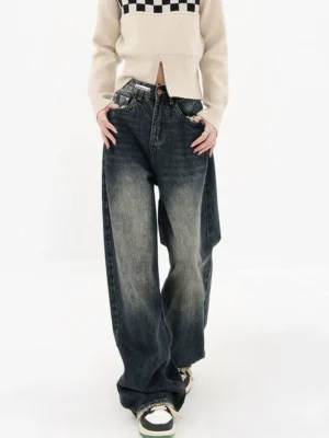 Deep blue high-waisted wide-leg jeans front view showing relaxed fit faded wash and vintage streetwear silhouette
