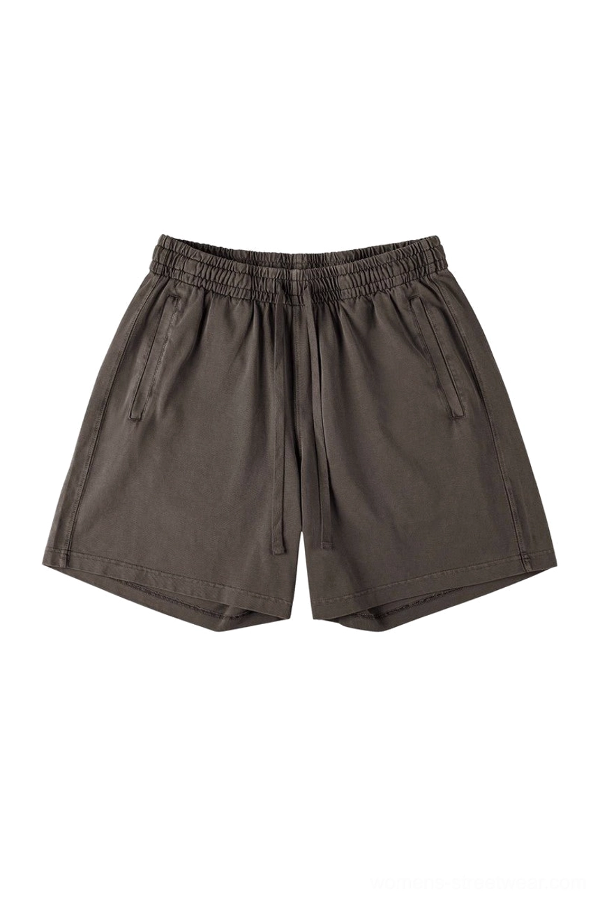 Deep brown washed cotton casual streetwear shorts with loose unisex fit elastic drawstring waistband and side pockets
