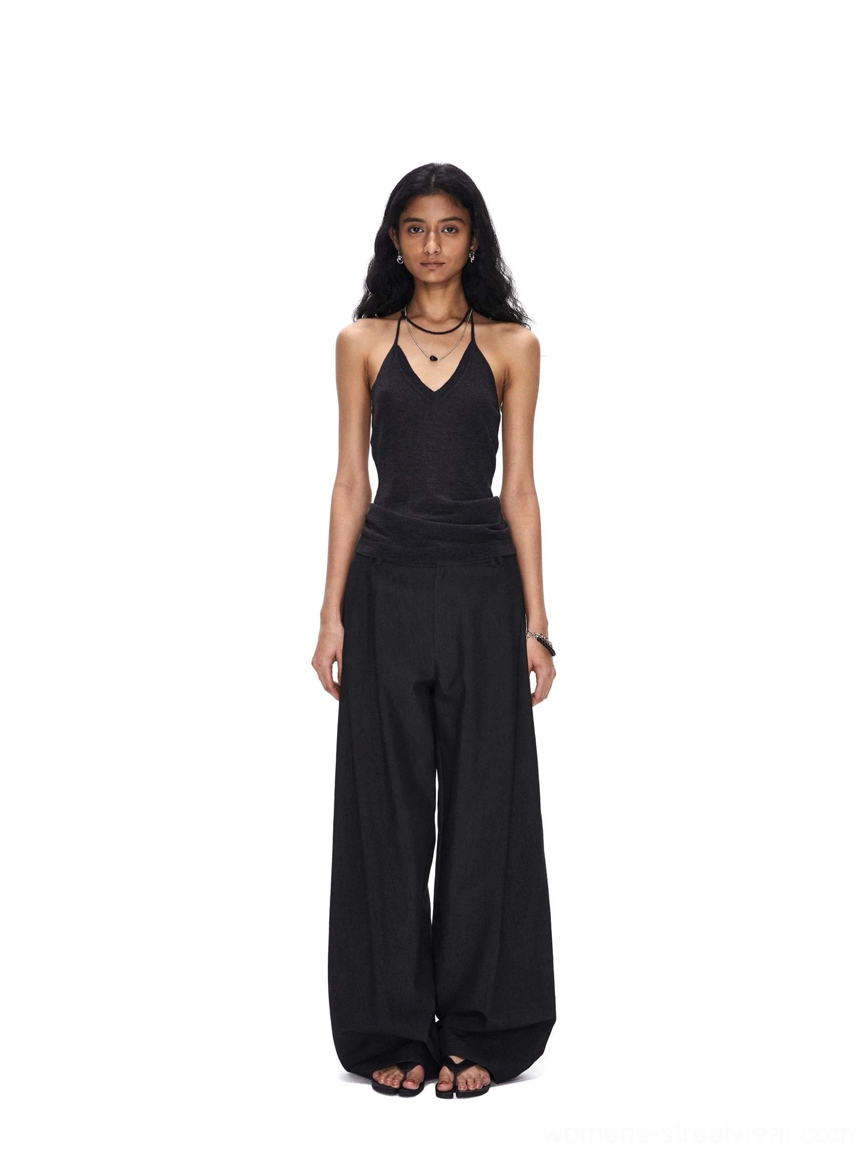 Deep gray pleated wide-leg streetwear trousers shown from the front with belt loops, clean waistband, tailored pleats, and full-length wide legs