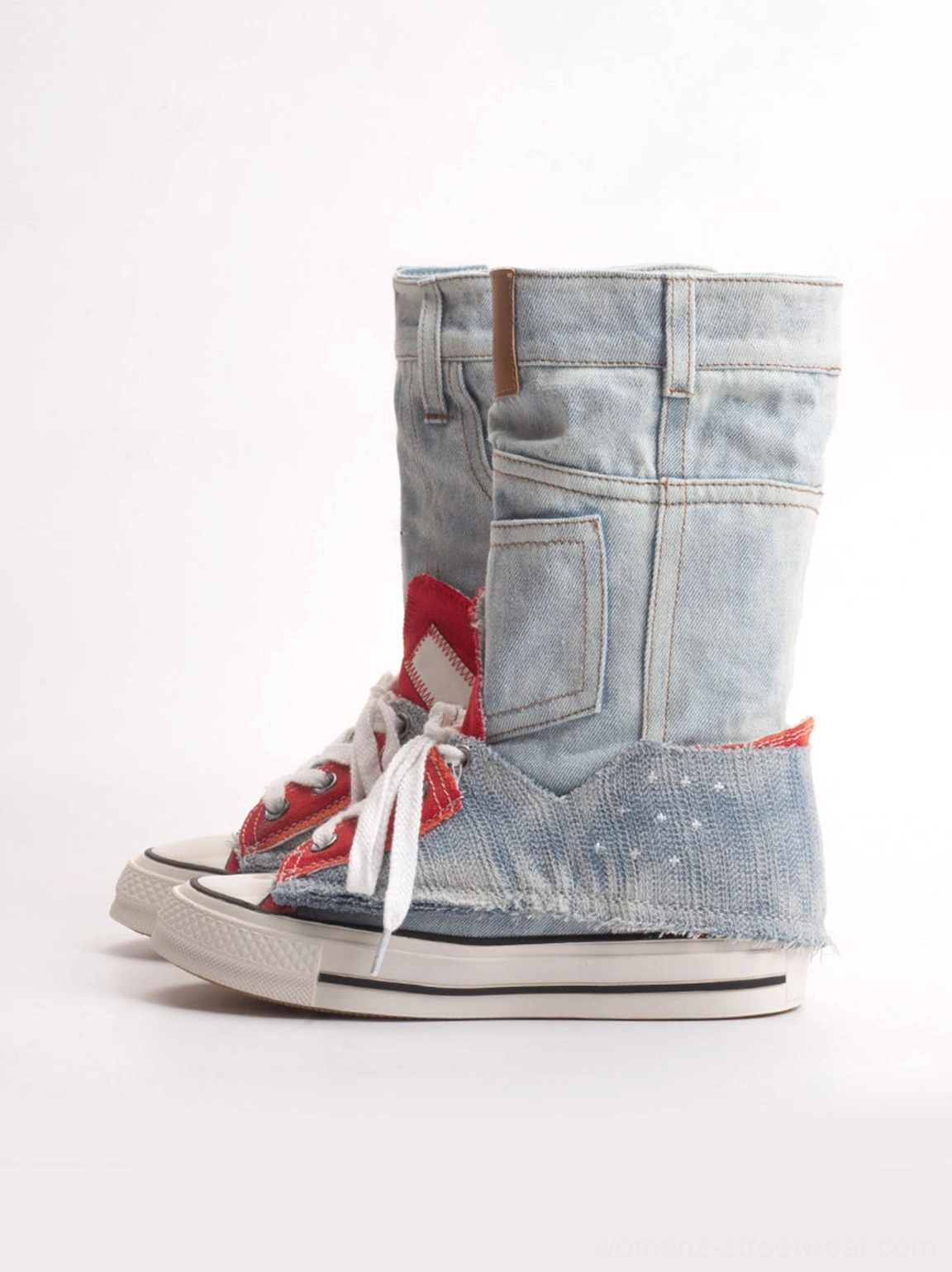 Right side view of denim fold-cuff high-top platform sneakers with brown cuff tab, frayed heel trim, red star vamp detail, and white outsole