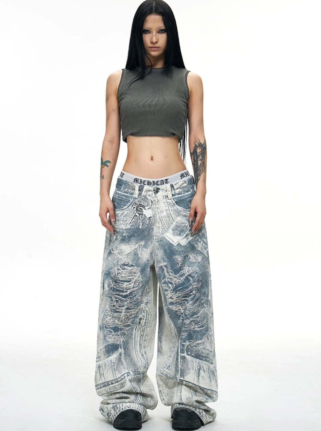 Full front view of distressed blue acid-wash wide-leg jeans with neat front pockets and oversized Korean streetwear fit