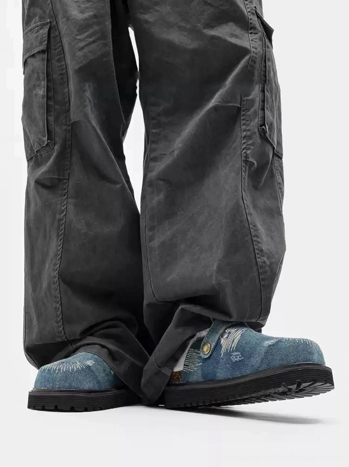 Front side streetwear outfit featuring distressed denim platform mule clogs with multi pocket dark gray cargo pants