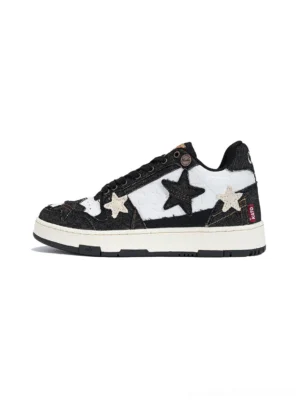 Distressed denim star low-top sneakers left side solo shot black white colorway star appliques streetwear aesthetic