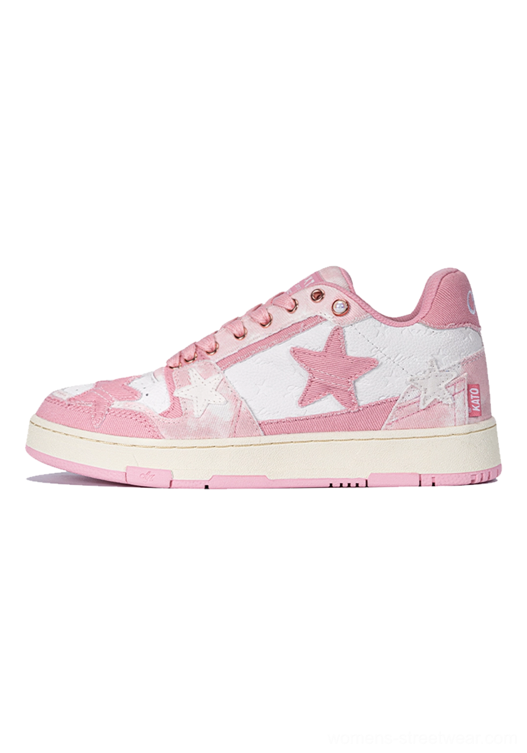 Pink distressed denim star low-top sneakers paired three-quarter view colorway y2k streetwear aesthetic