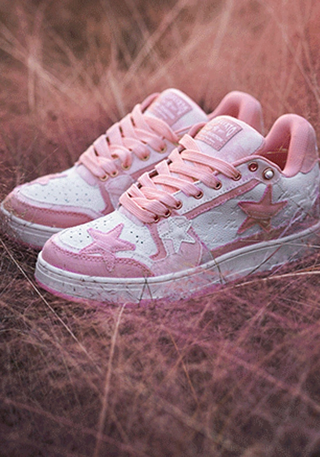 Distressed denim star low-top sneakers toe box detail star applique stitching precision craftsmanship front