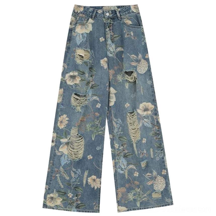 Distressed floral wide-leg jeans with vintage-inspired print and casual oversized streetwear proportions