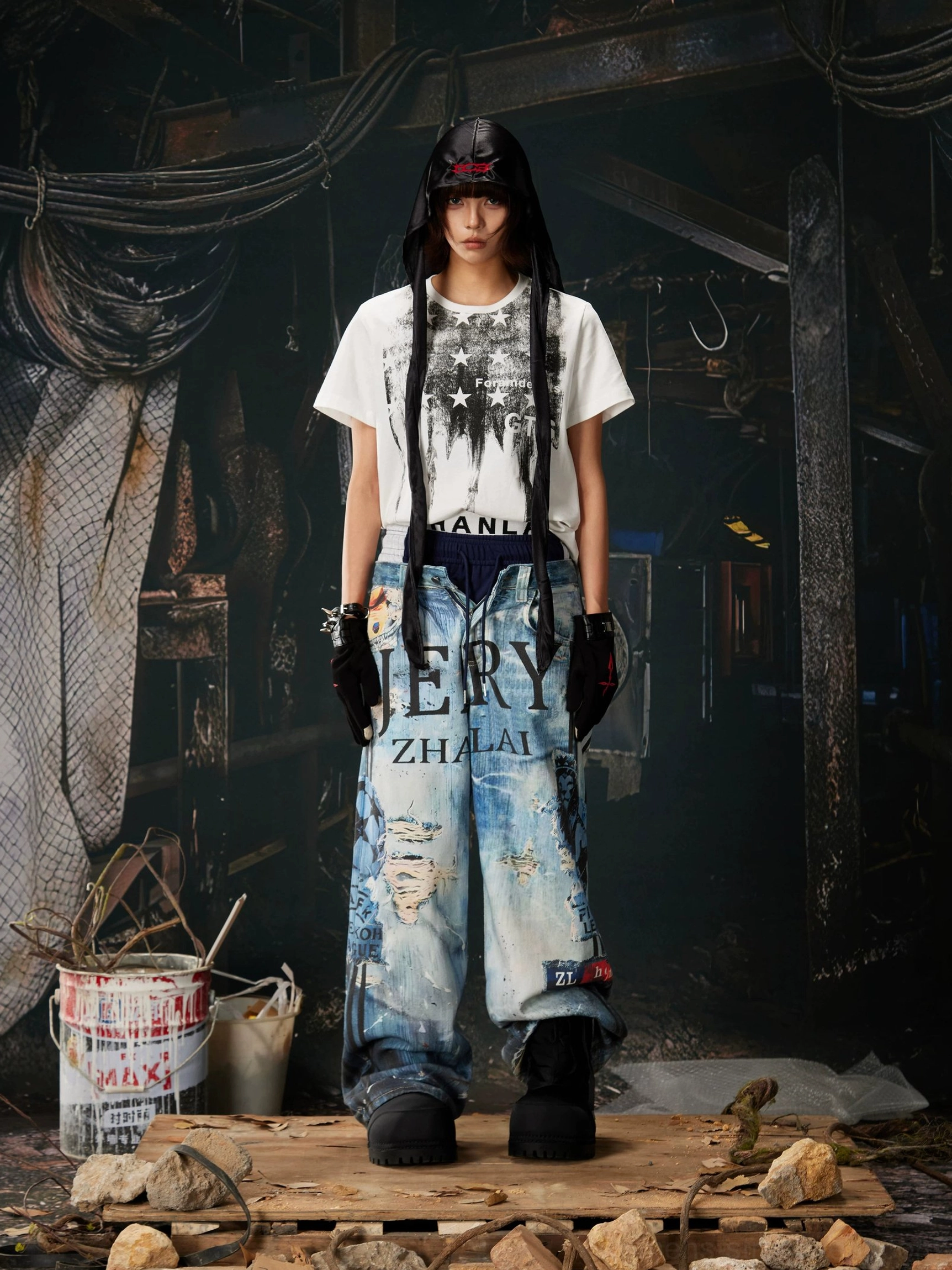 Ocean-wash distressed wide-leg jeans featuring graphic lettering, faded denim texture, ripped accents, and contemporary Korean streetwear appeal