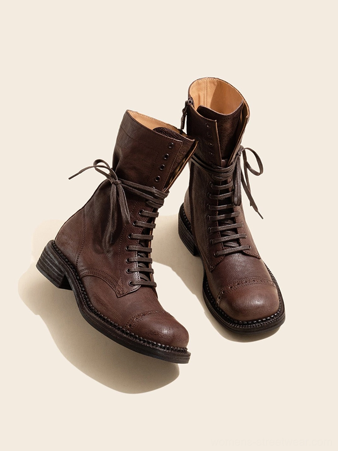 Distressed leather mid-calf lace-up combat boots detailed product view with vintage-inspired textured upper