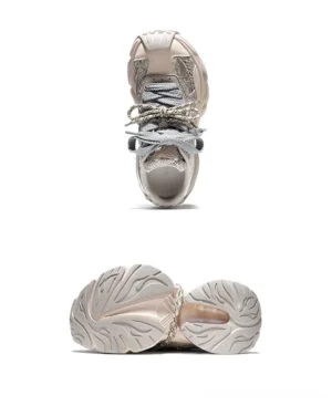 Top-down view of distressed mesh chunky sneakers showing thick round laces, layered upper construction and retro urban streetwear silhouette