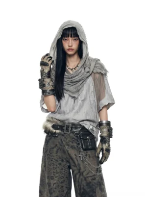 Female model wearing the distressed mesh hood scarf varsity jersey tee in wood grain gray, front full-body studio view