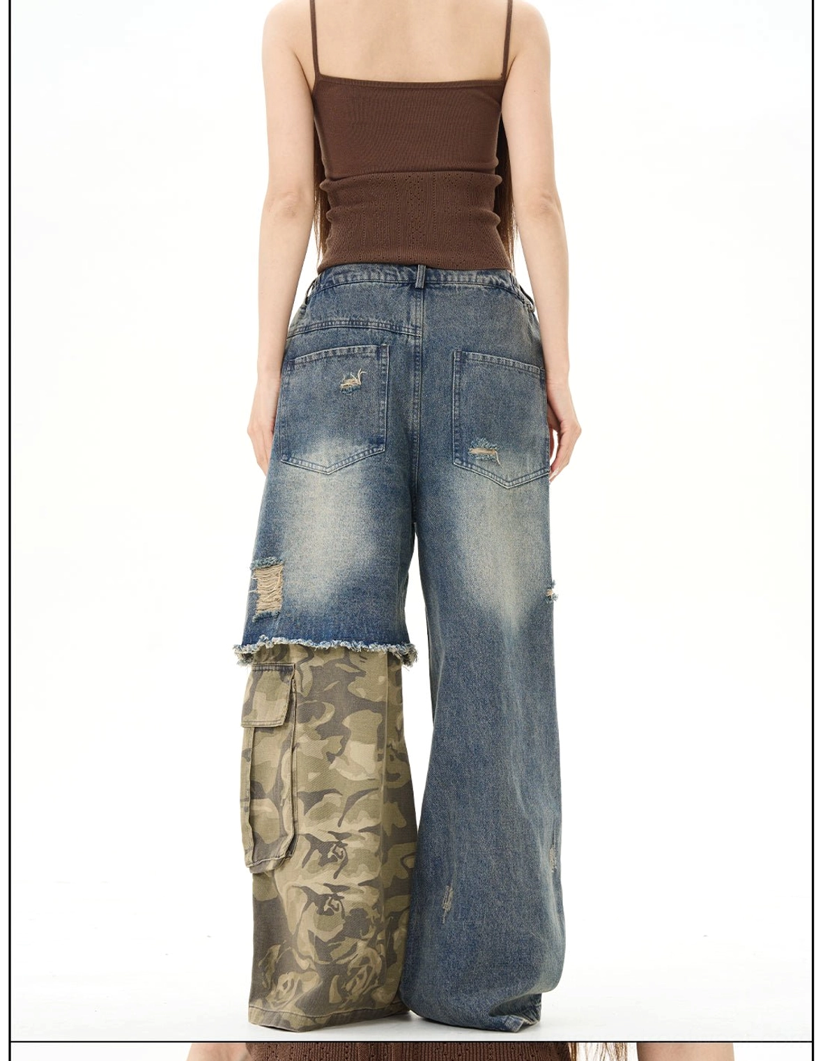 Distressed patchwork wide-leg jeans product image featuring vintage washed denim, camo cargo-inspired panels, ripped details, and an edgy contemporary streetwear silhouette