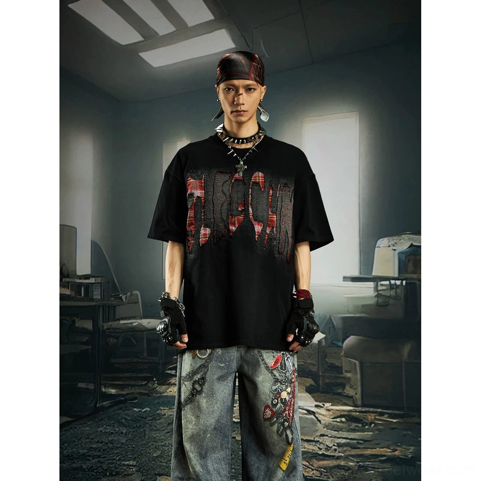 Black distressed plaid slash oversized graphic streetwear tee product view with layered red plaid chest artwork