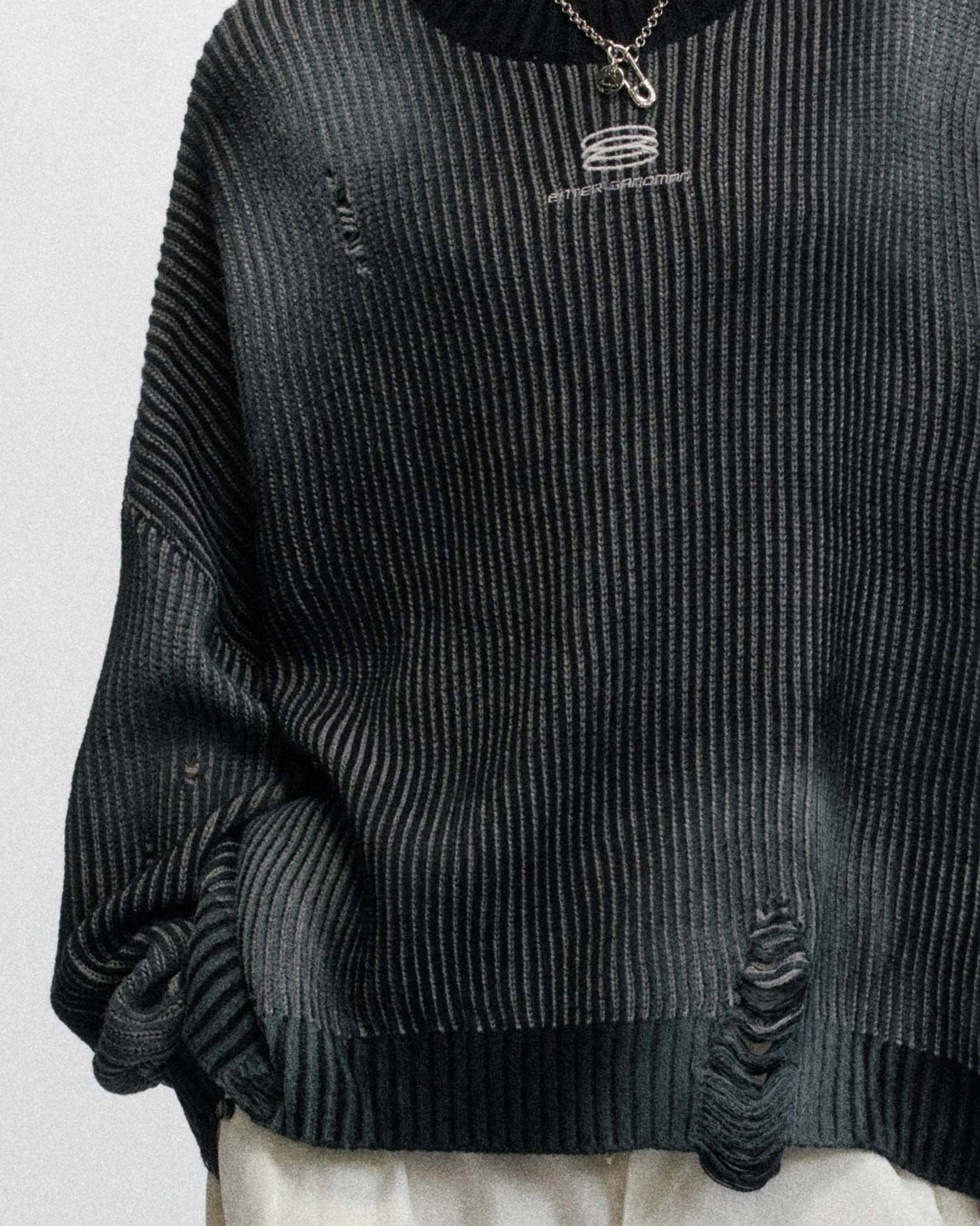 Distressed ribbed logo sweater styled as a relaxed Korean fashion knit with oversized proportions