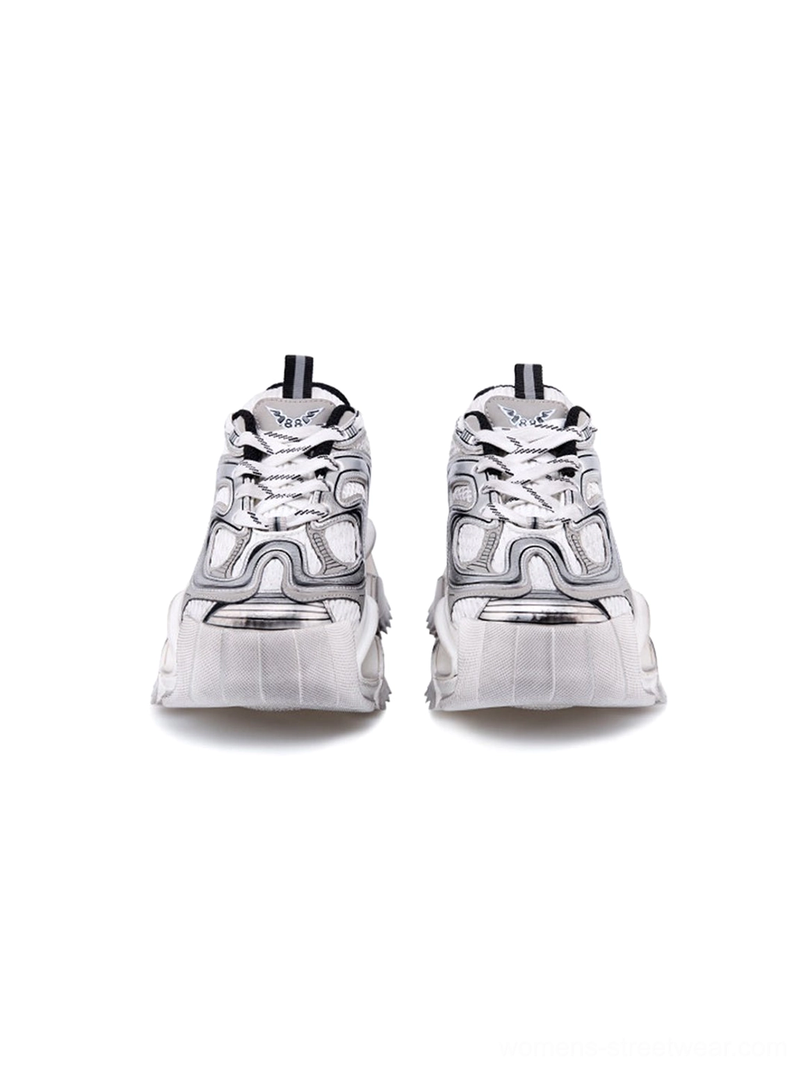 Top view of distressed silver chunky dad sneakers showing layered laces textured mesh toe box and sculpted sole