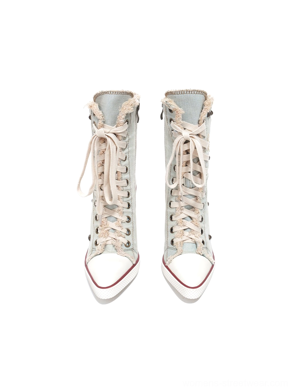 Front view of studded denim platform boots highlighting the white toe caps and lace-up design