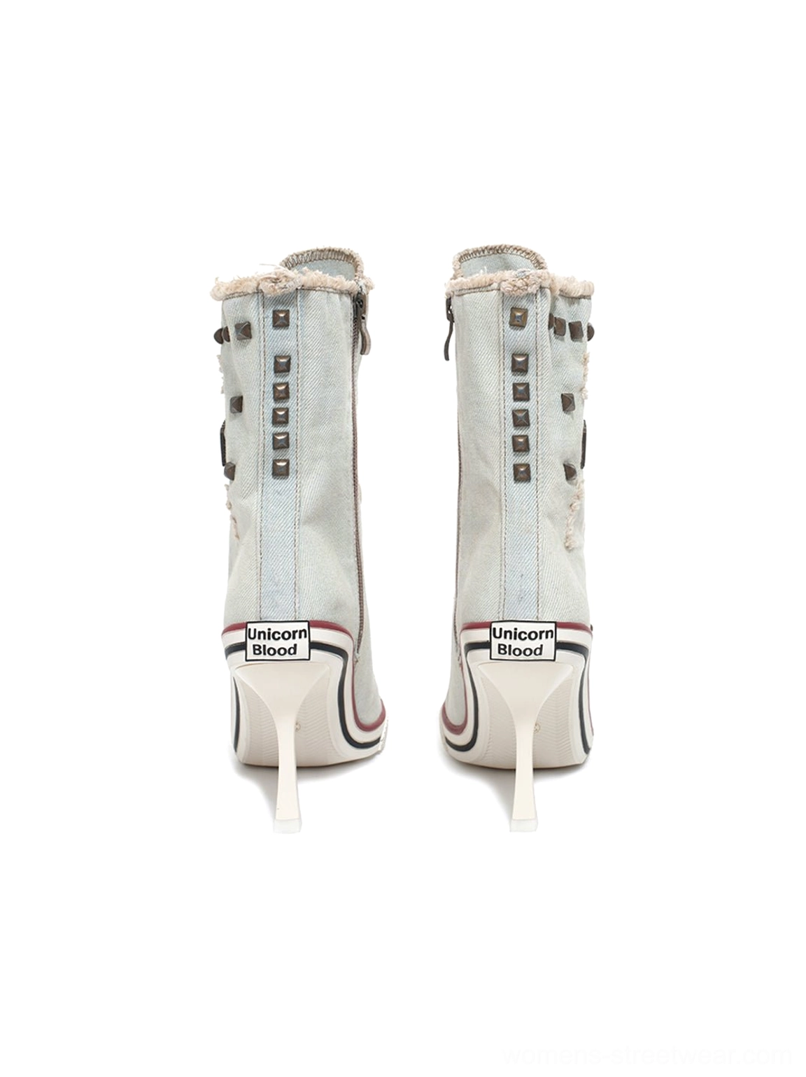 Rear view of distressed denim platform stiletto boots with studded heel counters and tall heels