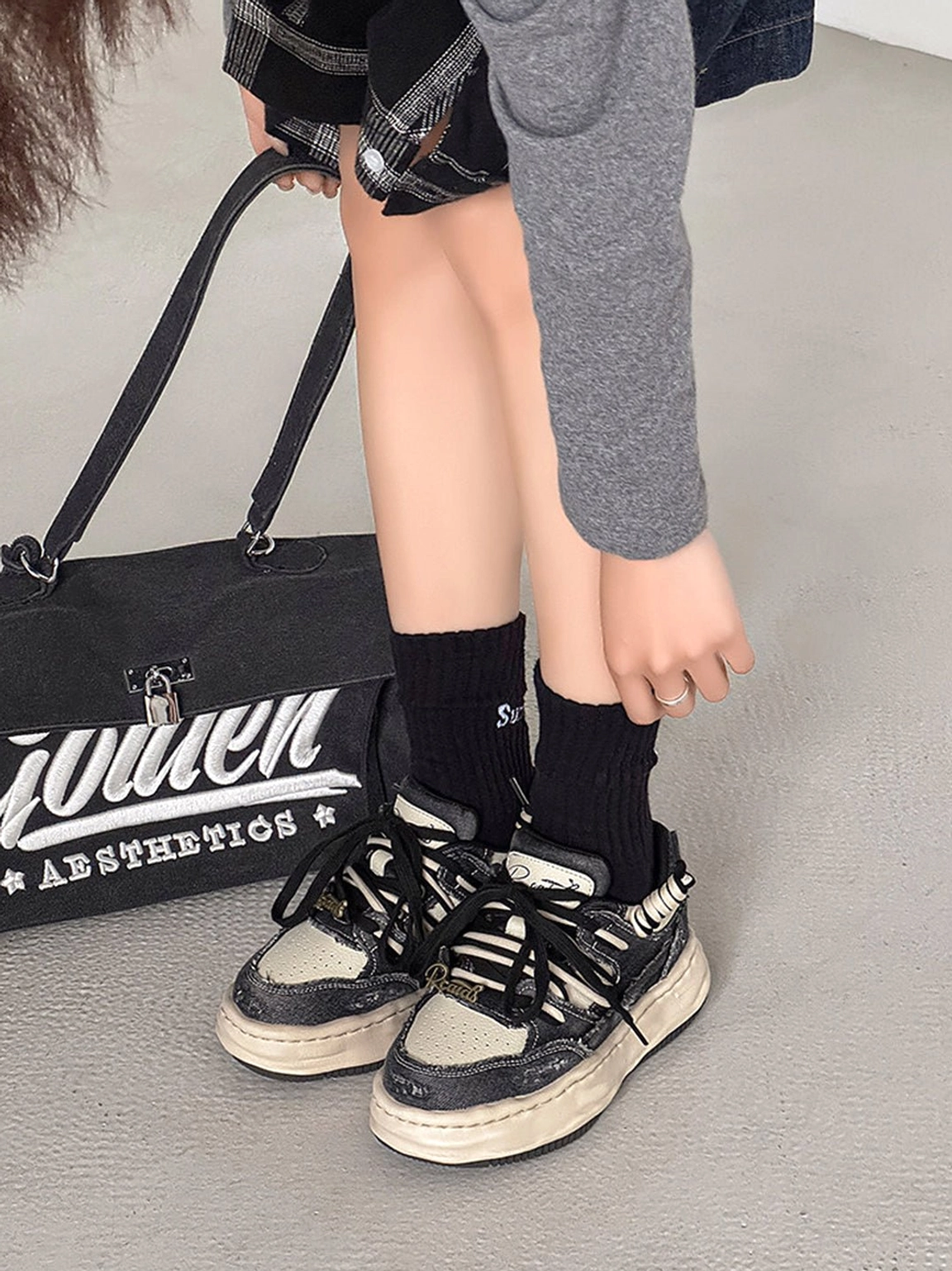 Distressed washed denim platform sneakers offering bold texture and easy styling with jeans, cargo pants, and hoodies