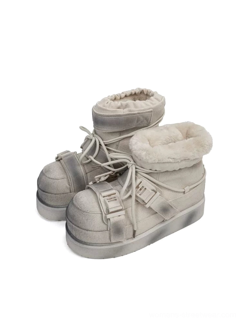 Pair of distressed white triple-buckle platform snow boots in flat lay view, featuring lace-up closure, padded upper and fuzzy fleece collar