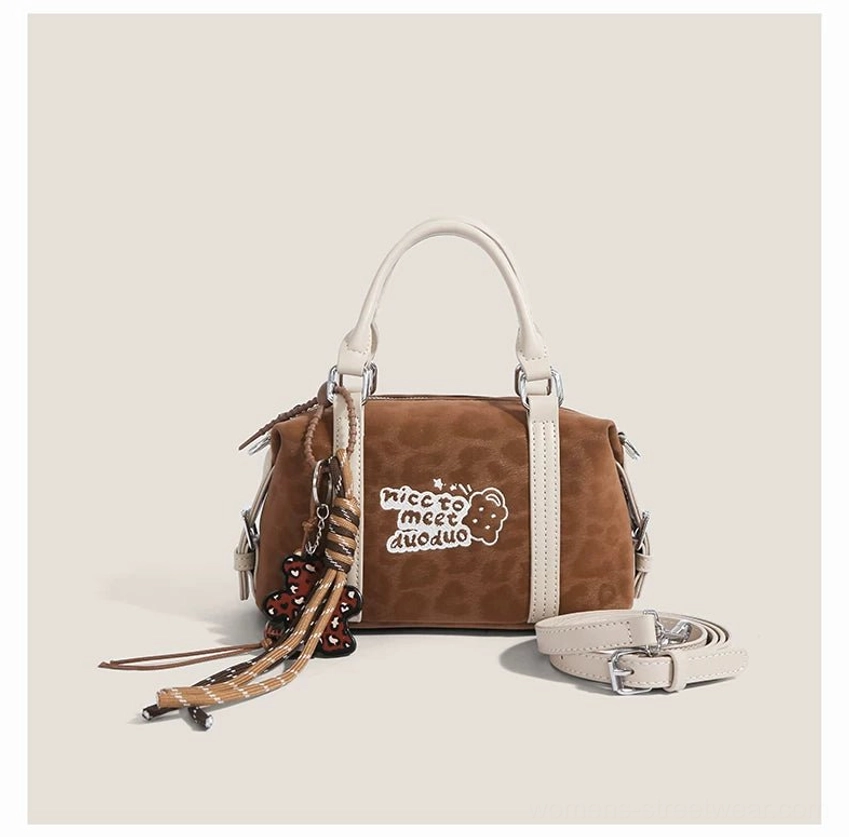 Leopard brown Doodle Charm mini barrel Boston bag with embroidered bear patch, contrasting trim, beaded tassel and shoulder strap
