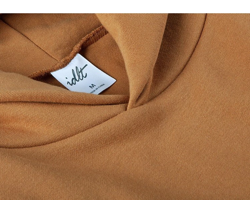Minimal heavyweight oversized hoodie ribbed hem and body shape detail