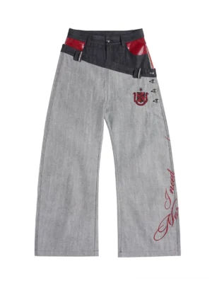 Gray double-waist curved-leg selvedge denim streetwear jeans with black red contrast waistband embroidery and metal hardware front flat lay
