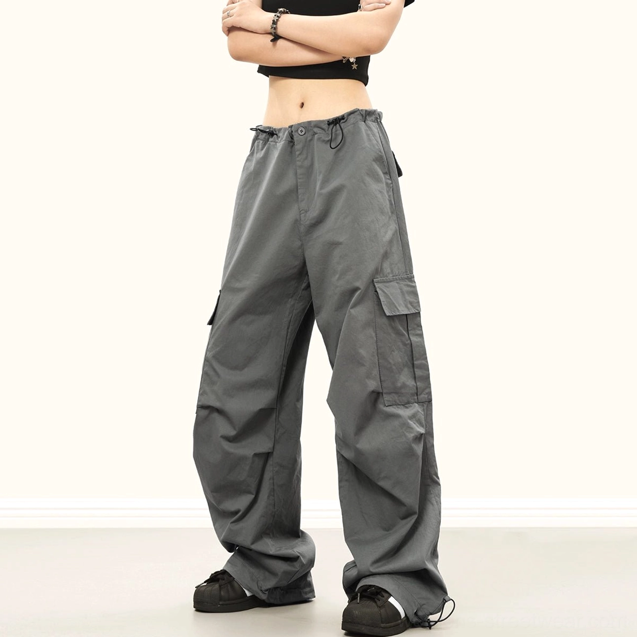 Downtown baggy streetwear cargo pants featuring roomy side cargo pockets, relaxed wide legs and adjustable drawstring details