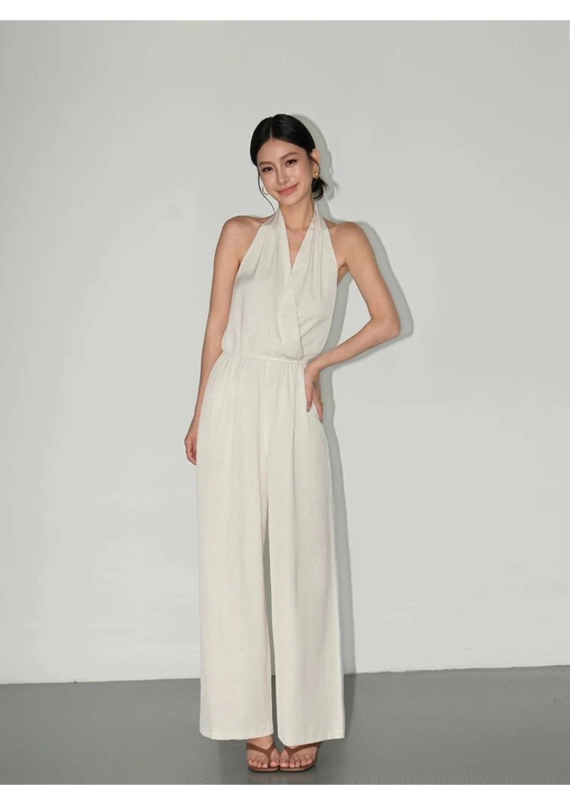 Draped halter wide-leg jumpsuit in a Korean-inspired streetwear silhouette with wrap neckline and flowing pants