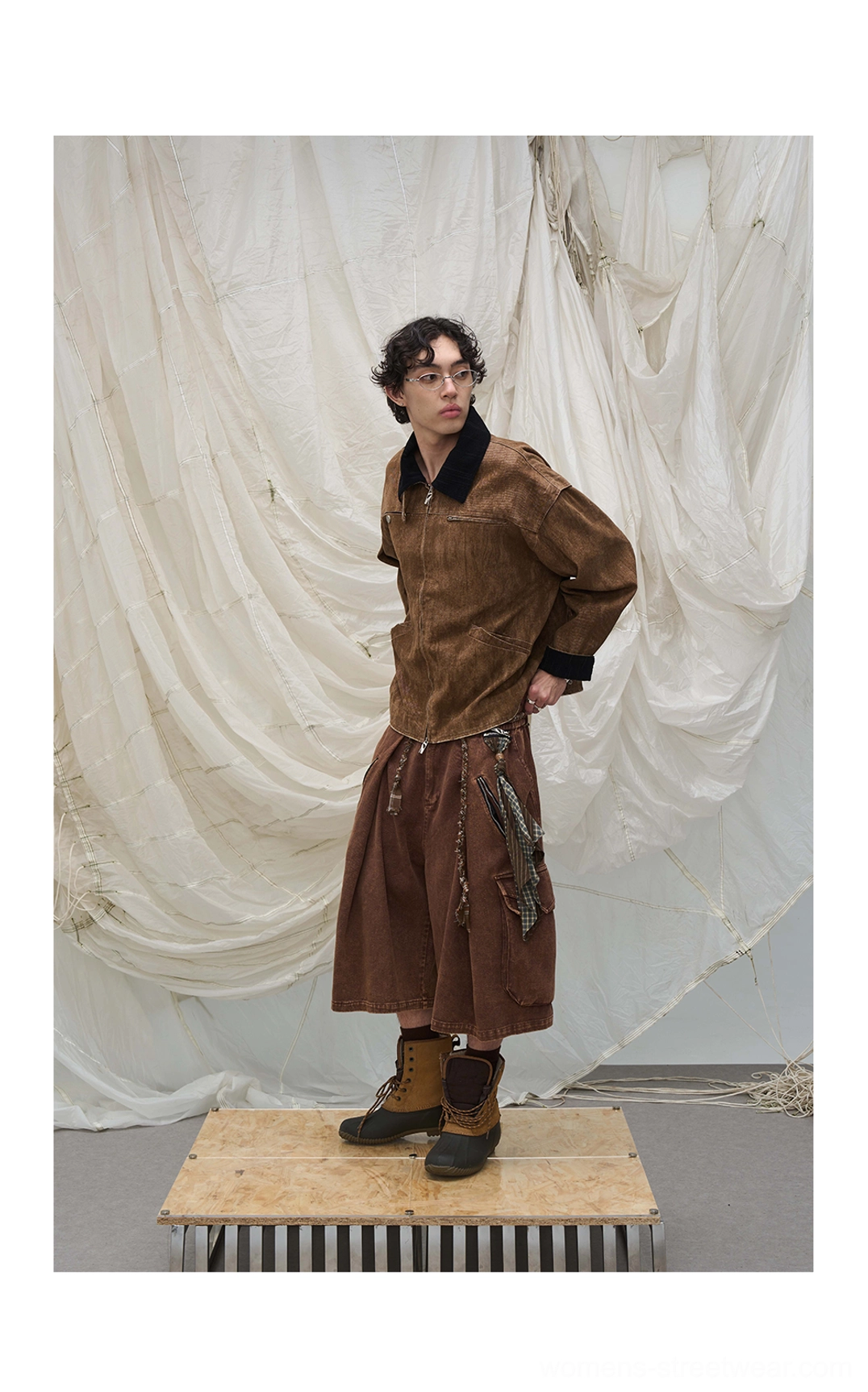 Relaxed cargo culotte shorts with decorative scarf layering, soft stretch cotton fabric, and oversized urban fit