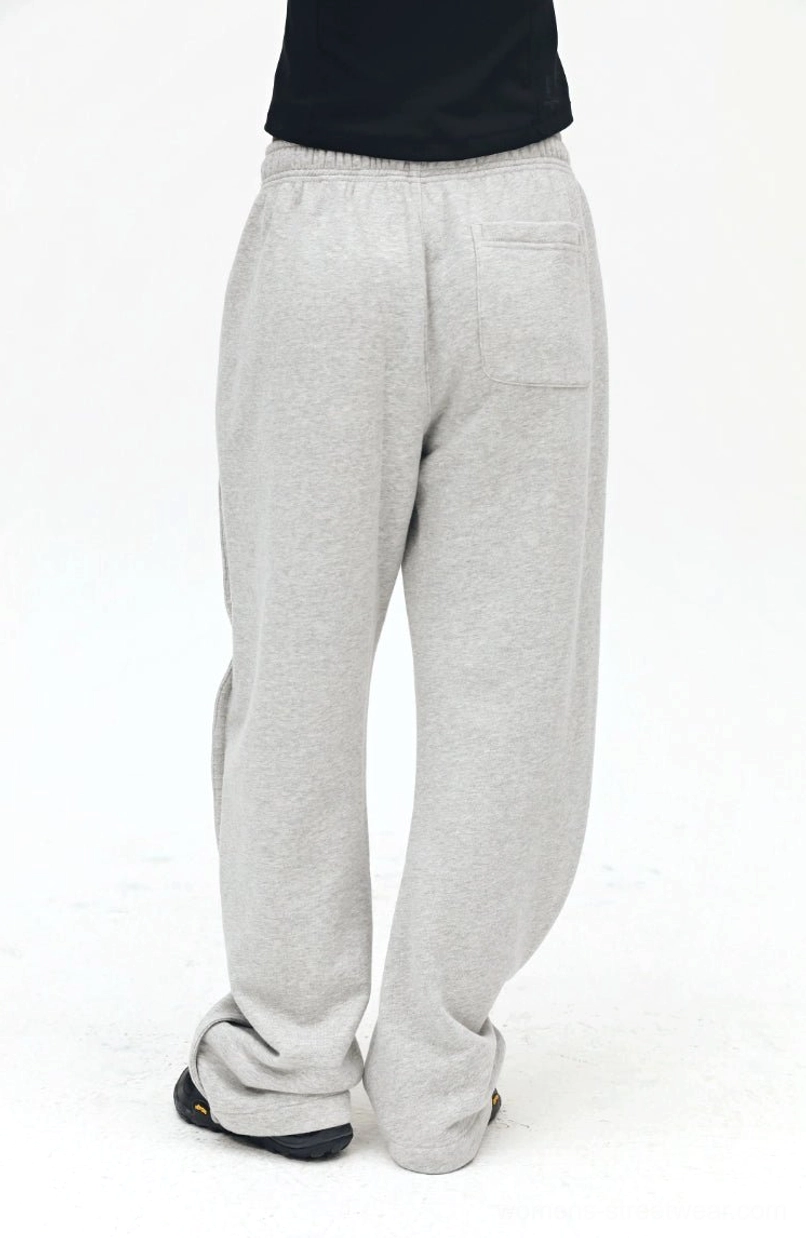 Drawstring detail and waistband construction - elastic drawstring sweatpants functional design feature