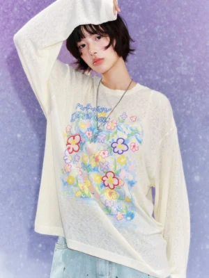 Cream Dream Garden floral graphic long sleeve streetwear tee on model with colorful flower print