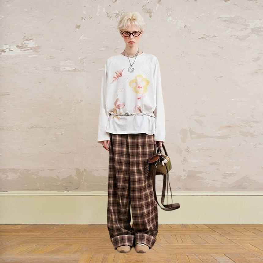 Oversized graphic sweatshirt styled with plaid wide-leg trousers - off-white floral printed sweatshirt vintage styling inspiration
