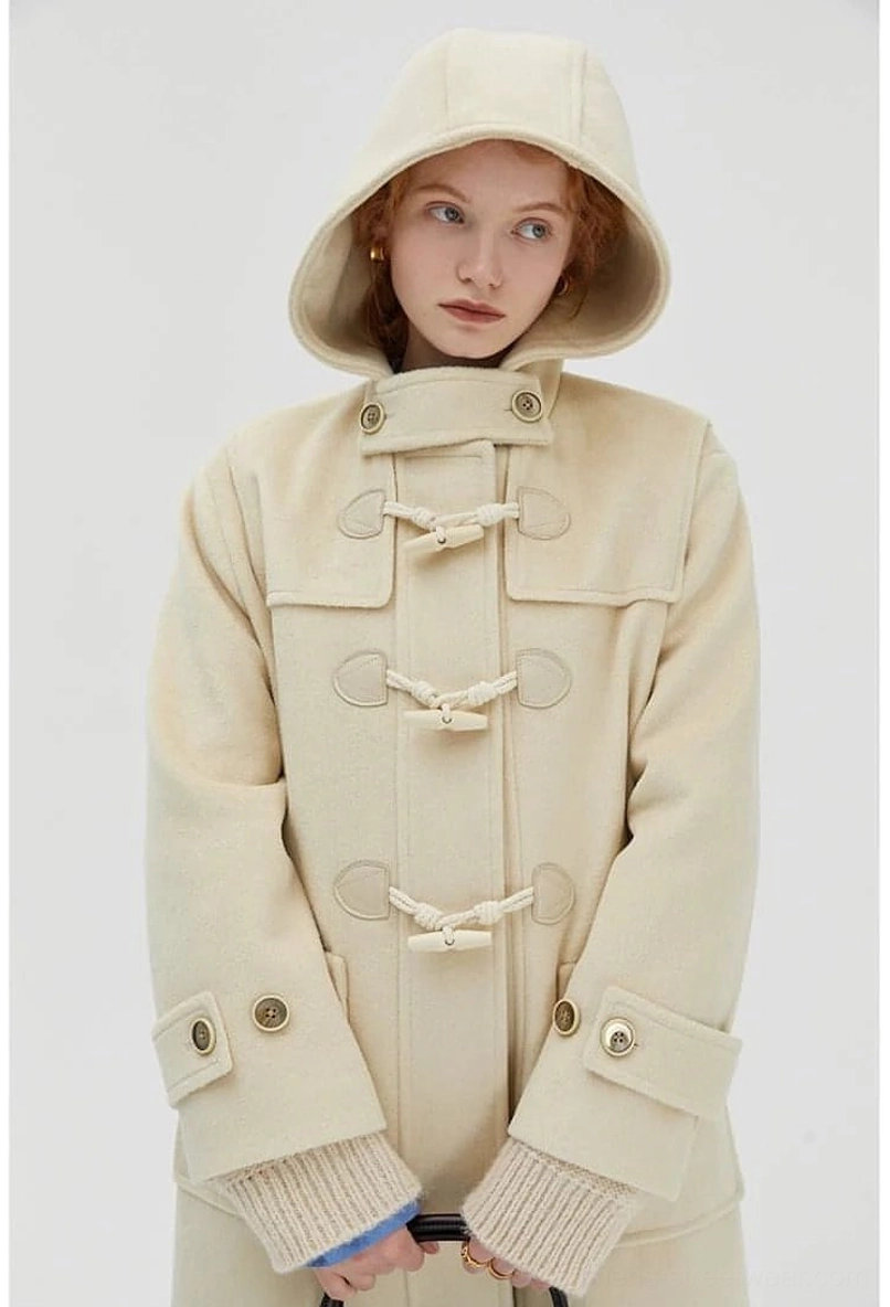 Wool duffle coat hood attached design showing functional hooded silhouette and construction