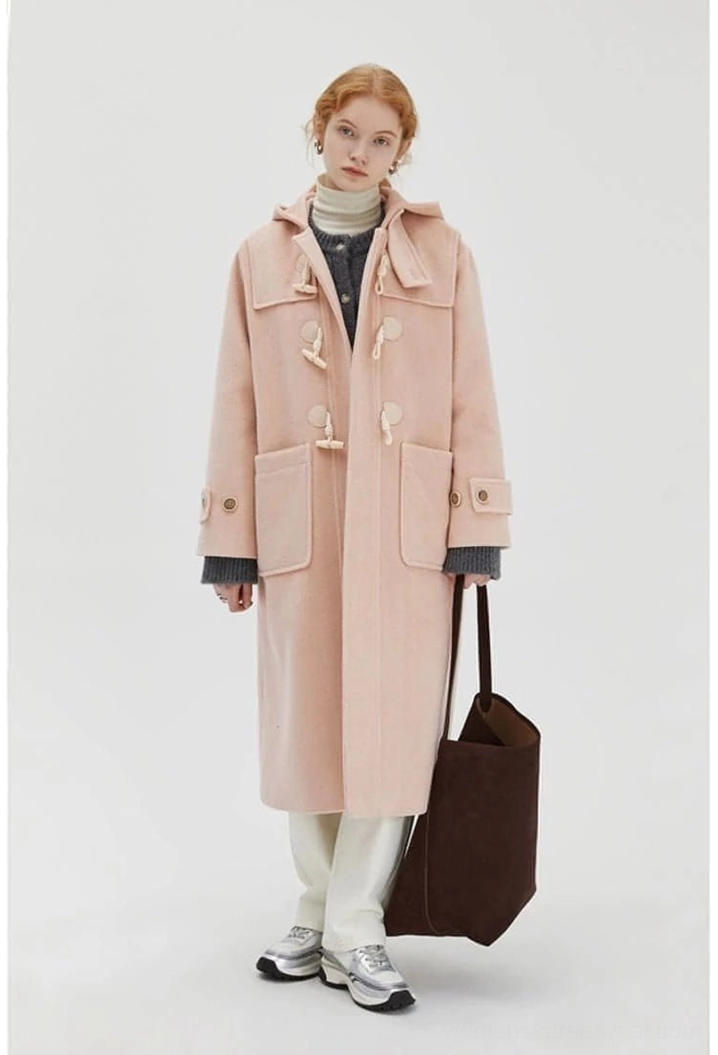 Wool duffle coat styled with casual streetwear outfit model demonstrating styling versatility