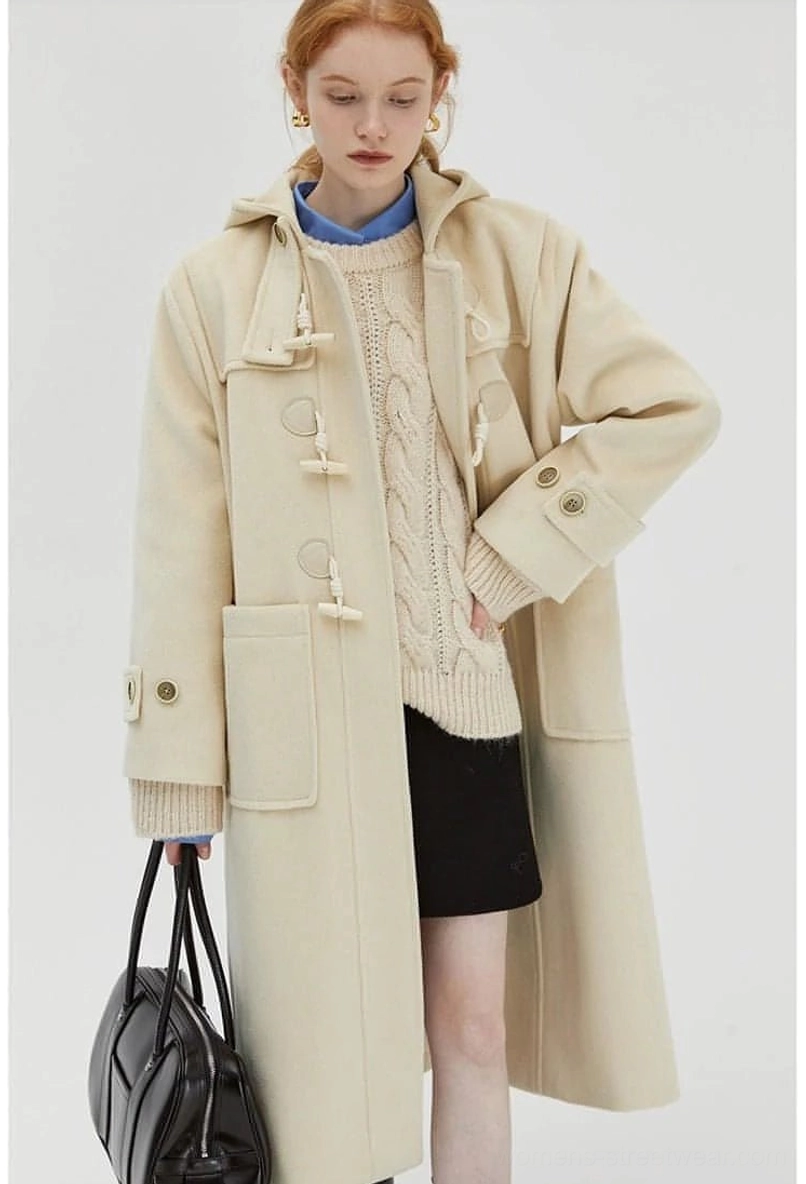 Duffle coat worn open showing interior lining and drape on model full length view