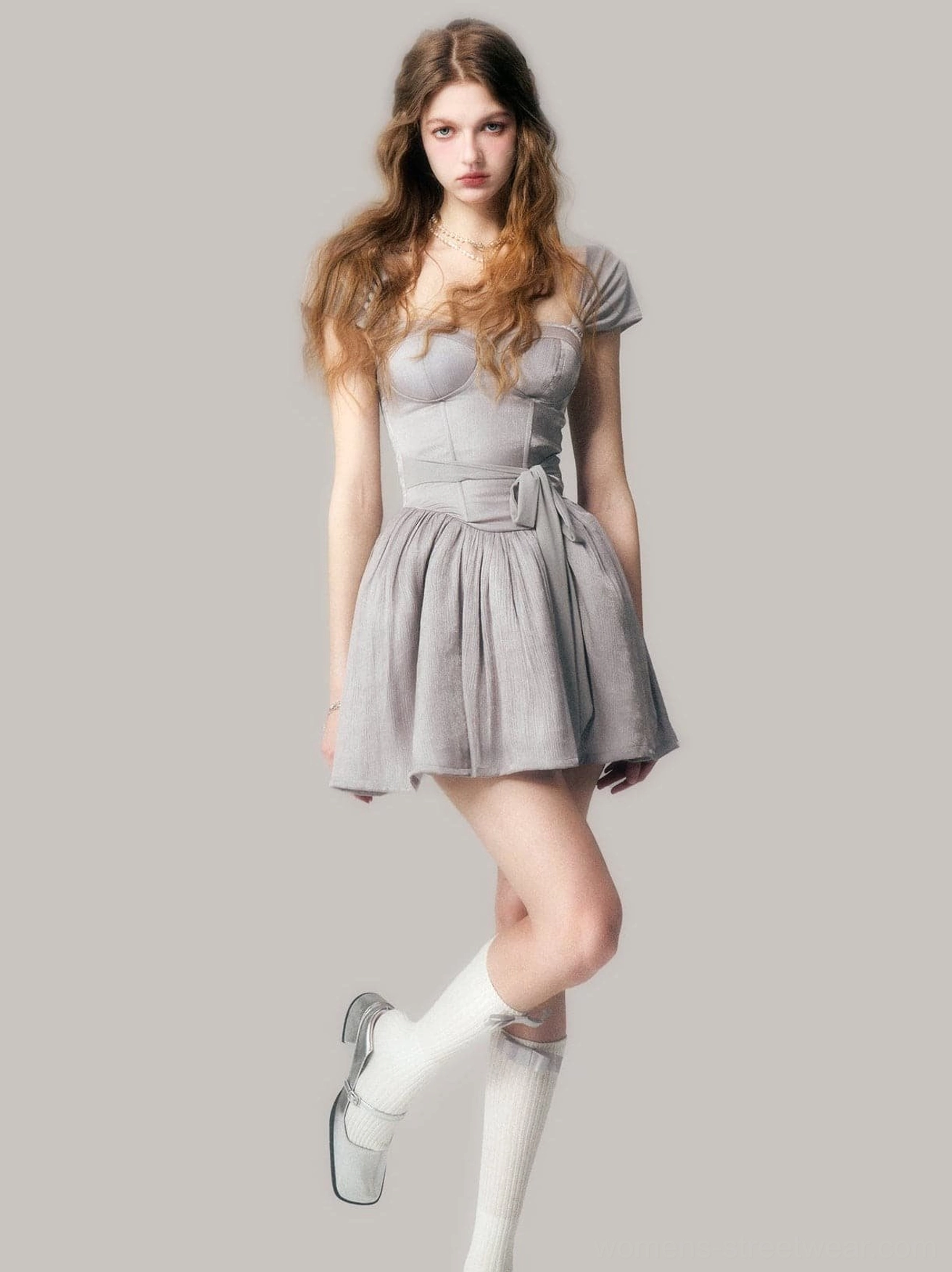 Dusty gray corset tutu dress styled with white loafers and knee high socks for a Korean streetwear outfit