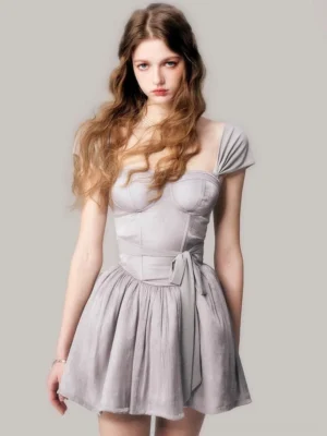 Dusty gray corset tutu mini dress with sweetheart neckline, short cap sleeves, waist sash, and flared skirt shown from the front