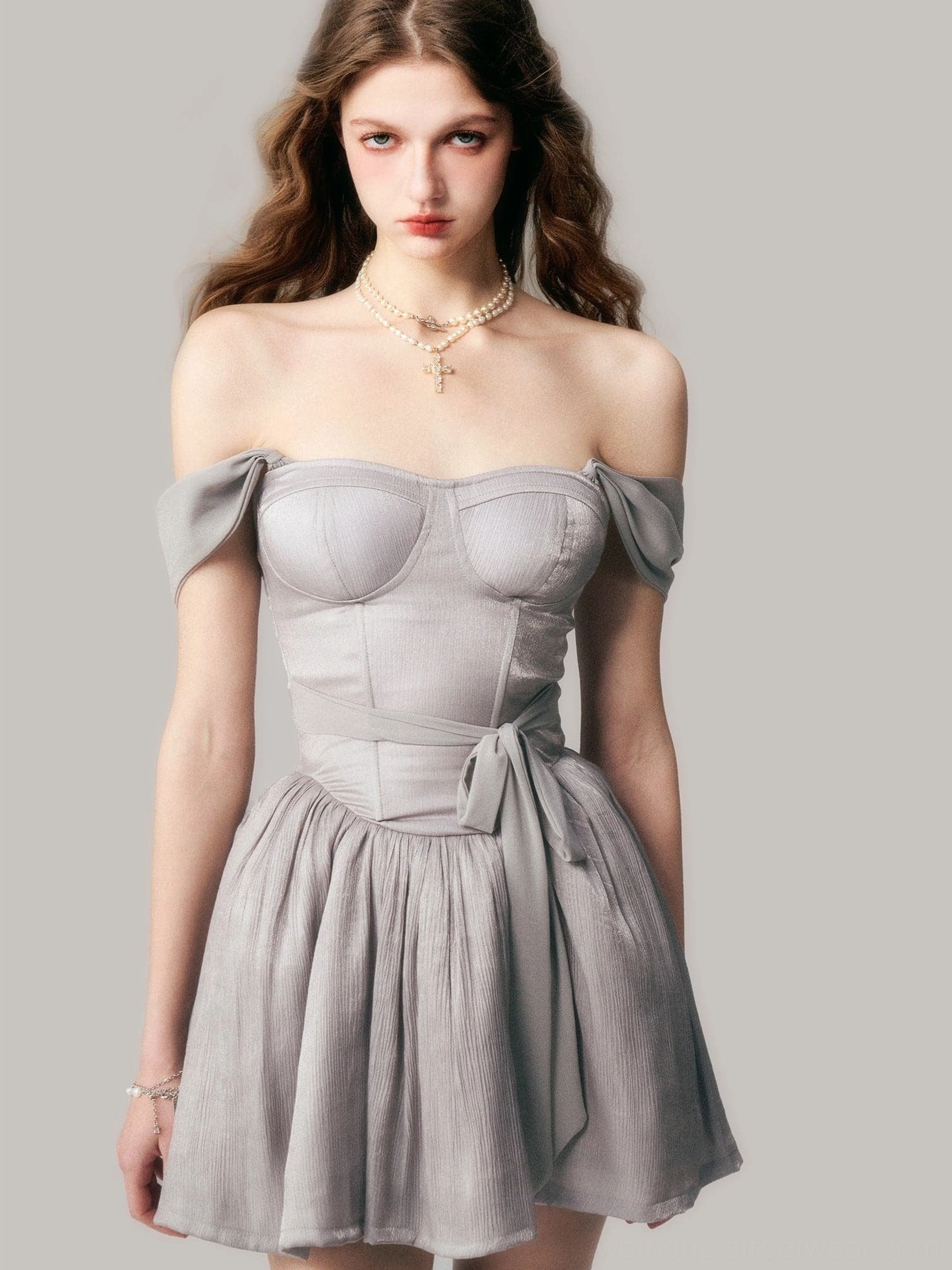 Dusty gray off shoulder corset mini dress with structured bust cups, tie waist sash, and flowy pleated tutu skirt