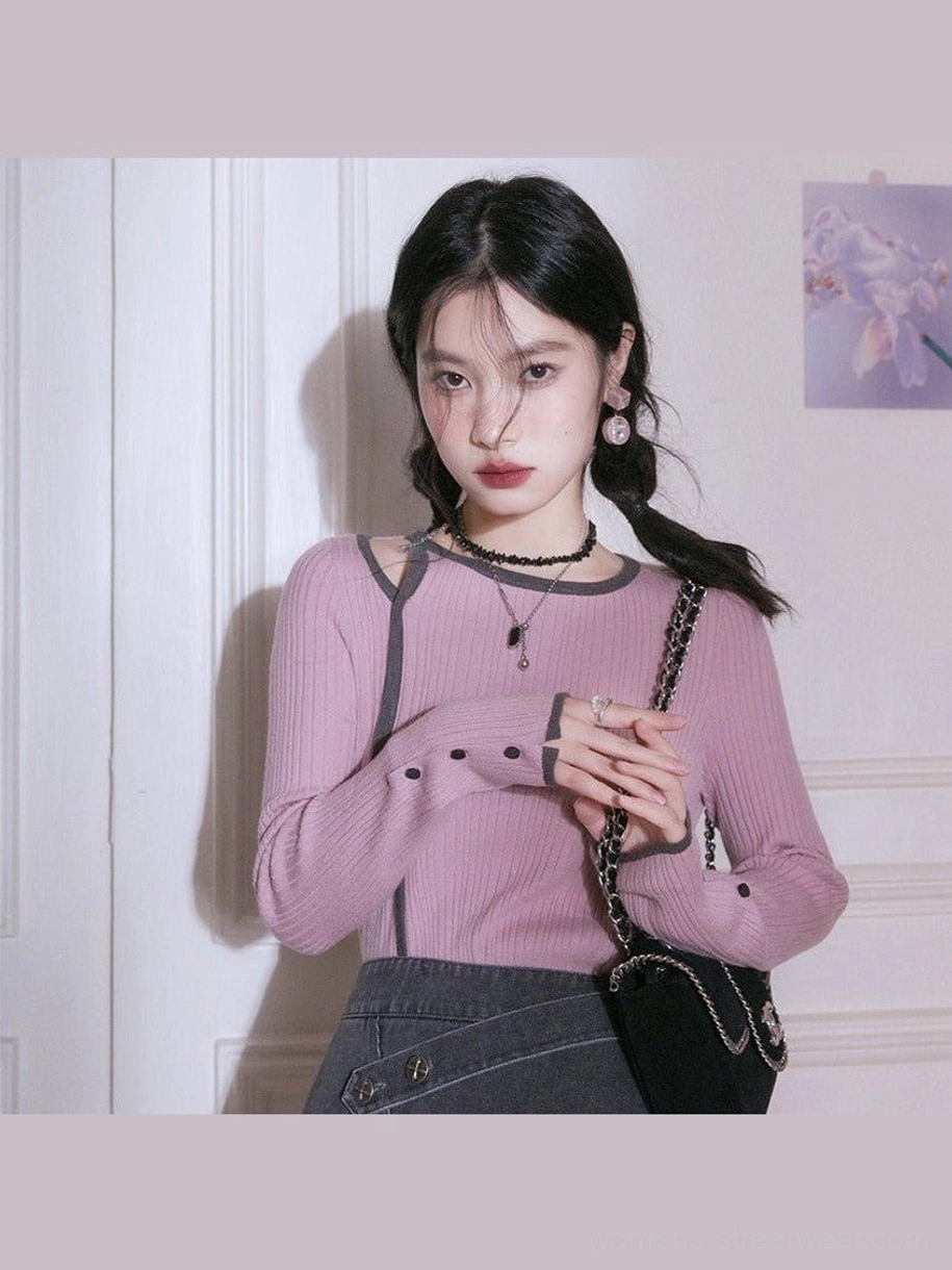 Dusty pink cutout shoulder ribbed knit top with dark gray contrast neckline and cuffs front view