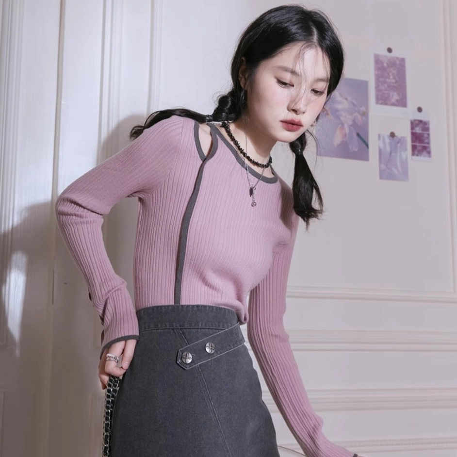 Dusty pink cutout shoulder ribbed knit top with dark gray trim styled in Korean streetwear look