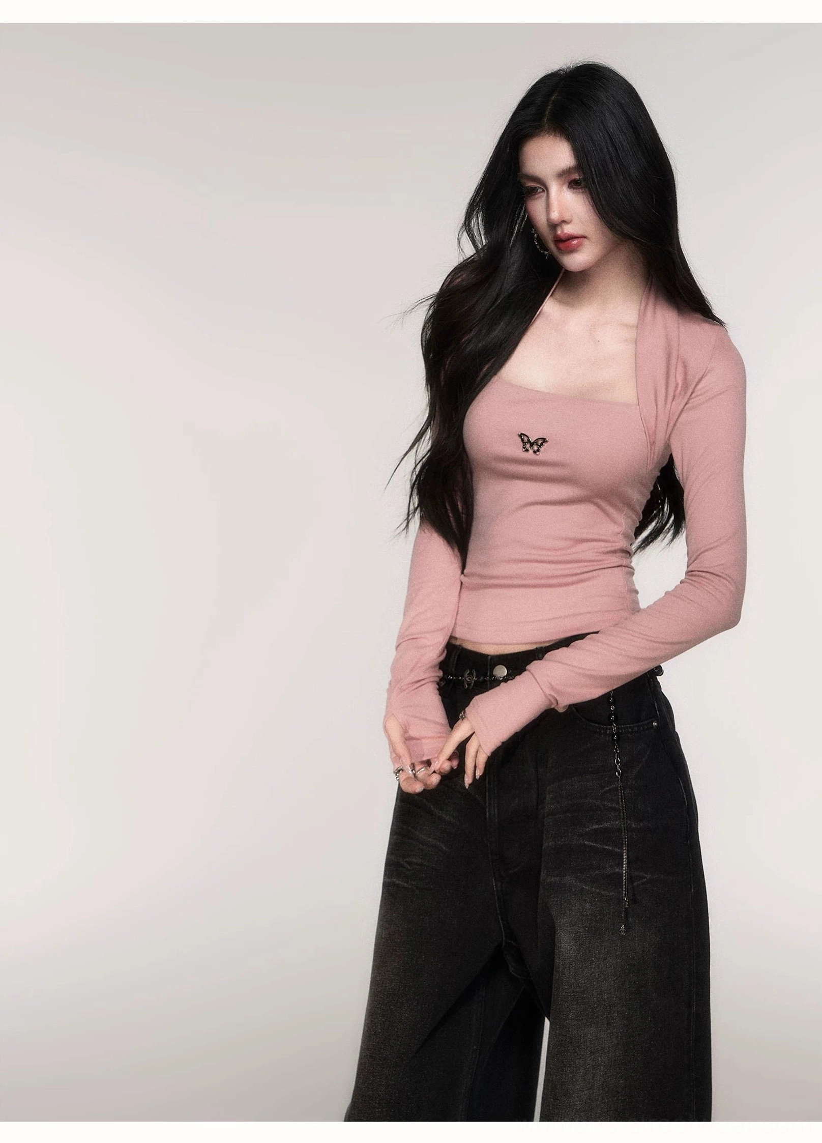 Dusty Pink fitted ribbed knit top with integrated long-sleeve shrug, open shoulders, metal butterfly chest detail, and Korean streetwear styling