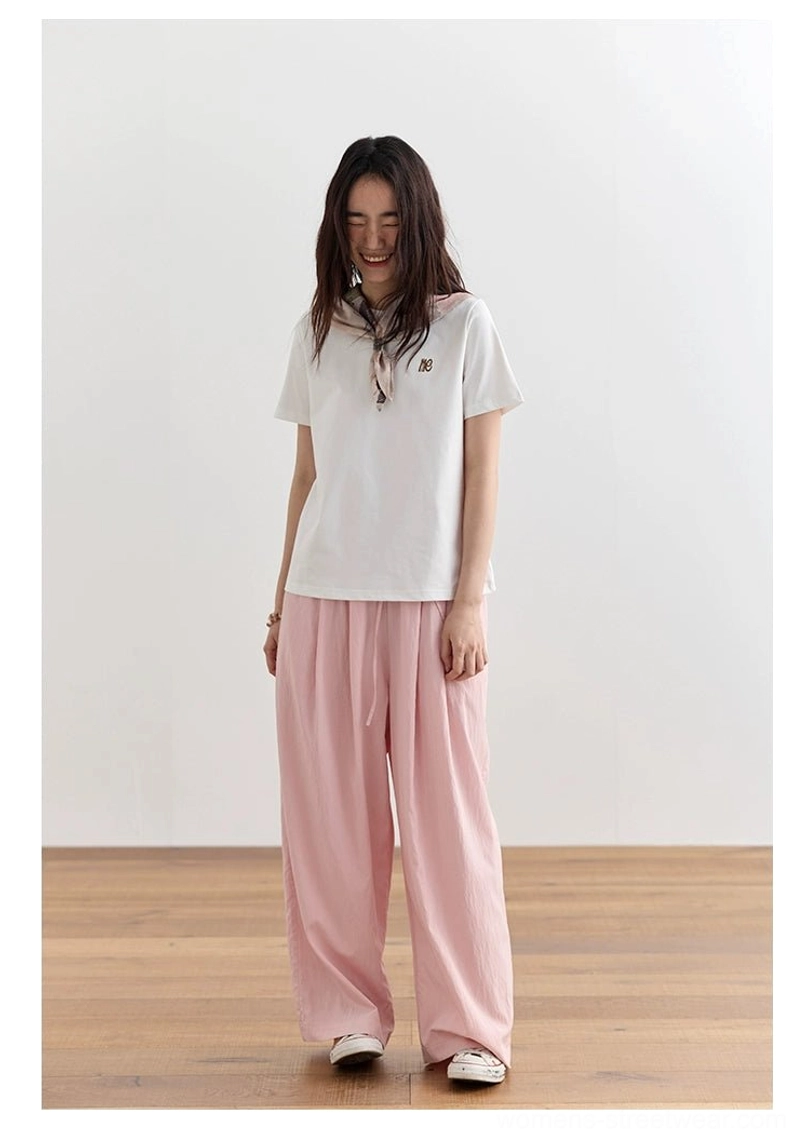 Dusty pink minimalist embroidered logo crew neck t-shirt cotton blend breathable fabric performance