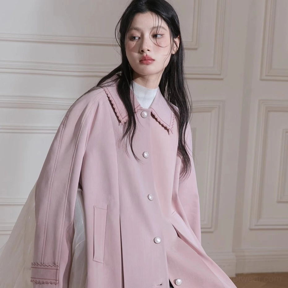 Unbelted relaxed fit dusty pink scalloped cuff trench coat with clean single-breasted silhouette