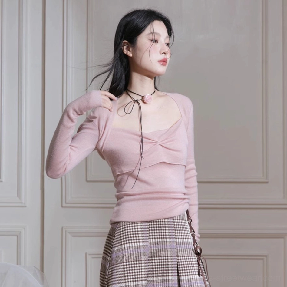 Front waist up view of dusty pink twist bust knit top with soft ribbed texture and square neckline