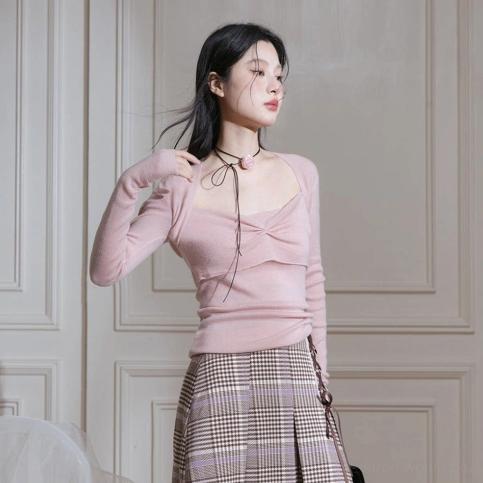 Korean inspired dusty pink twist front knit top worn with a plaid pleated midi skirt and rose choker