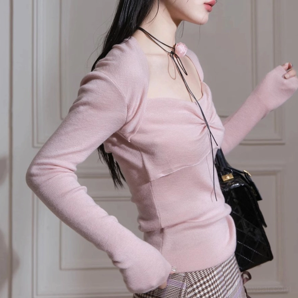 Dusty pink twist front ribbed knit top product detail in Korean inspired feminine streetwear style