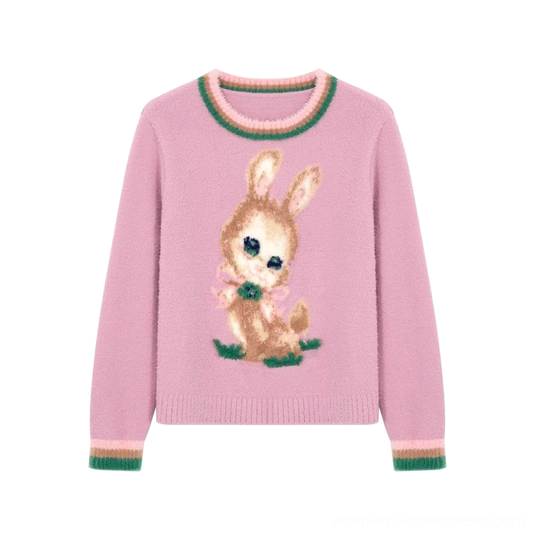 Flat lay dusty pink vintage bunny pattern knit sweater with green and pink crew neck trim, long sleeves, and soft fuzzy knit texture