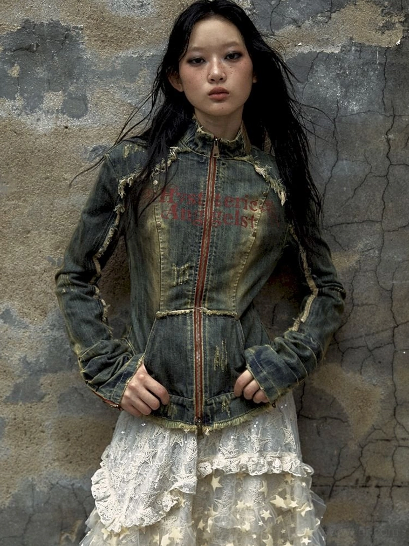 Edgy denim corset jacket with acid-wash texture, front zipper, and frayed streetwear details