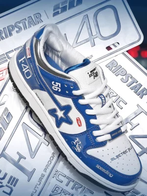 Pair of electric blue retro racing skate sneakers shown from an angled top view with star graphics, number 56, racing prints, and thick anti-slip outsole